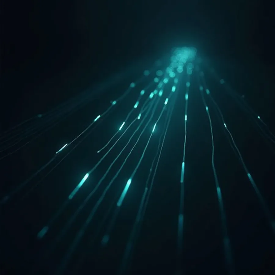 Abstract render of many strands of teal light drawn in from the dark toward one bright point